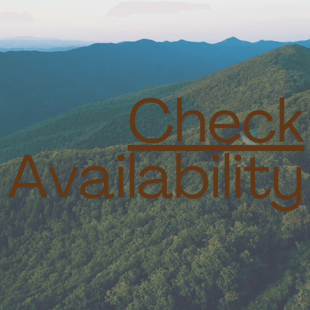Aerial view of lush green mountains with the text "Check Availability" overlaid.